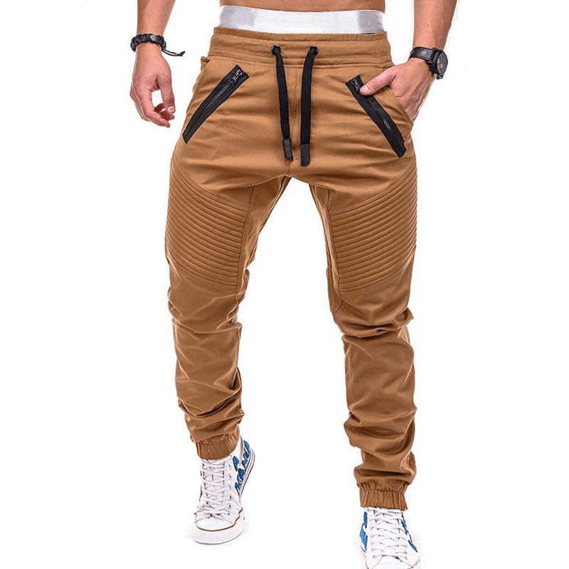 Men's casual jogger pants in tan with multi-pockets and stylish ribbed detailing for ultimate comfort and style.