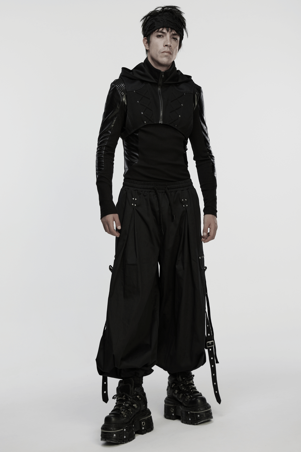Men's Cyberpunk Hooded Mesh Vest with Spliced Panels worn by a model showcasing its unique style and futuristic vibe.