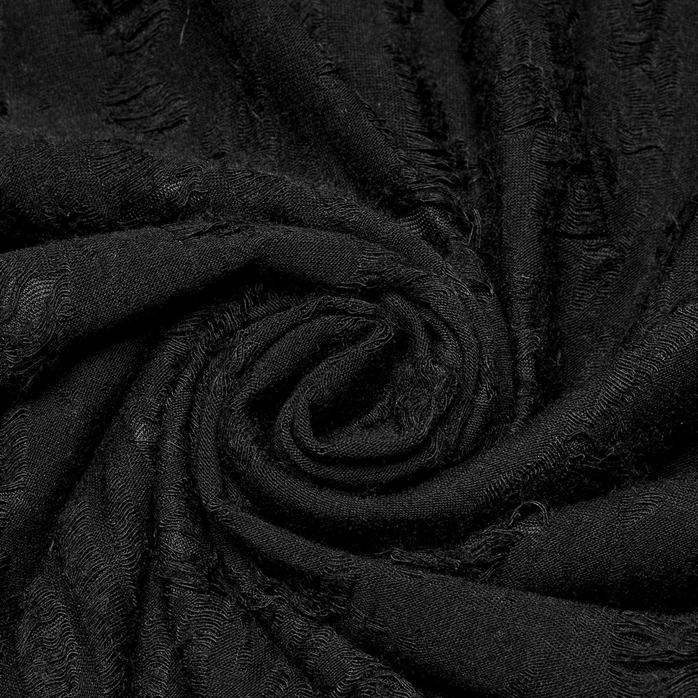 Close-up of soft black fabric showcasing a textured, distressed pattern for a dark punk hoodie.