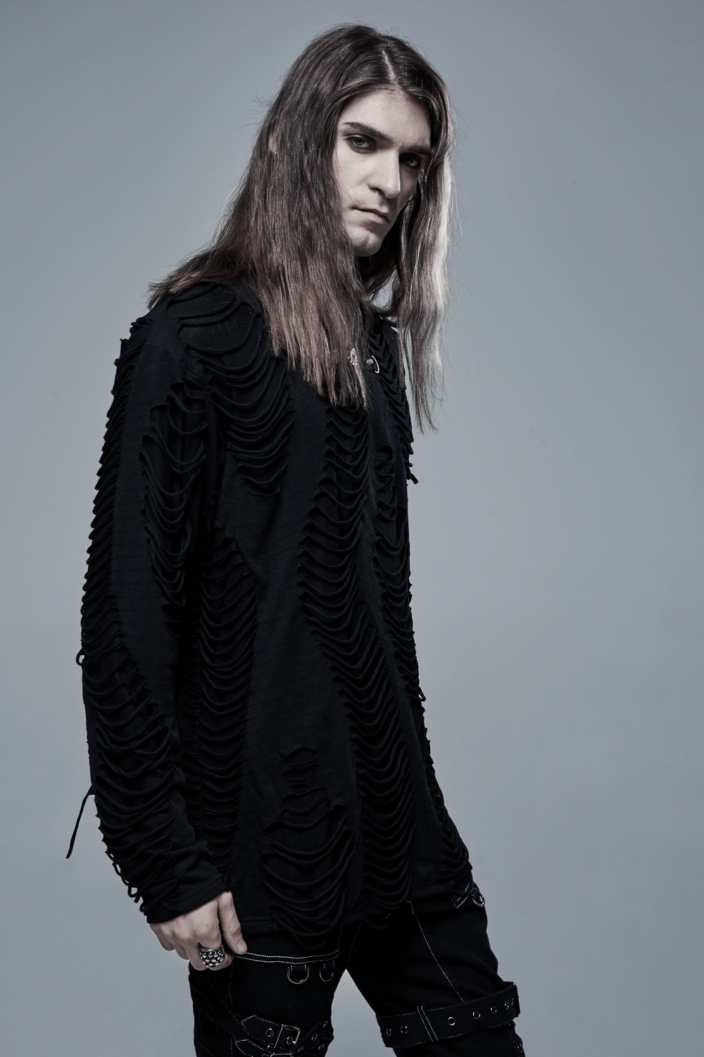 Men's distressed ripped gothic long sleeves sweatshirt in urban style, showcasing intricate textures and a relaxed silhouette.