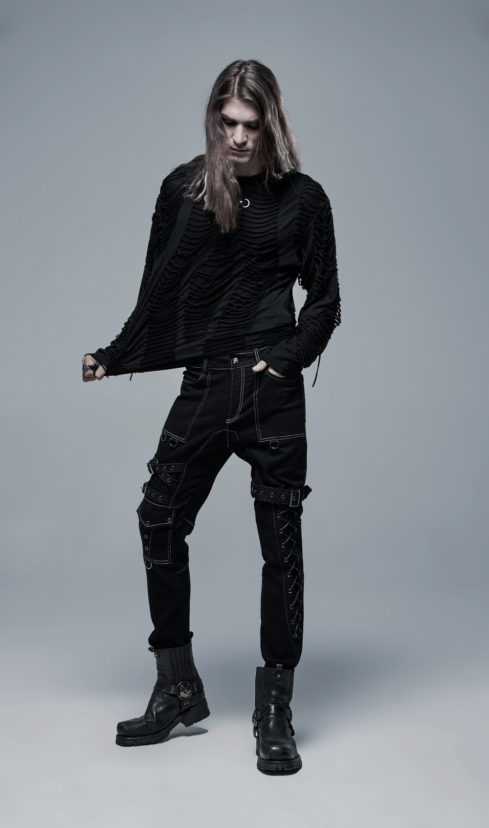 Gothic men's long-sleeved sweatshirt with distressed details, paired with edgy black cargo pants.