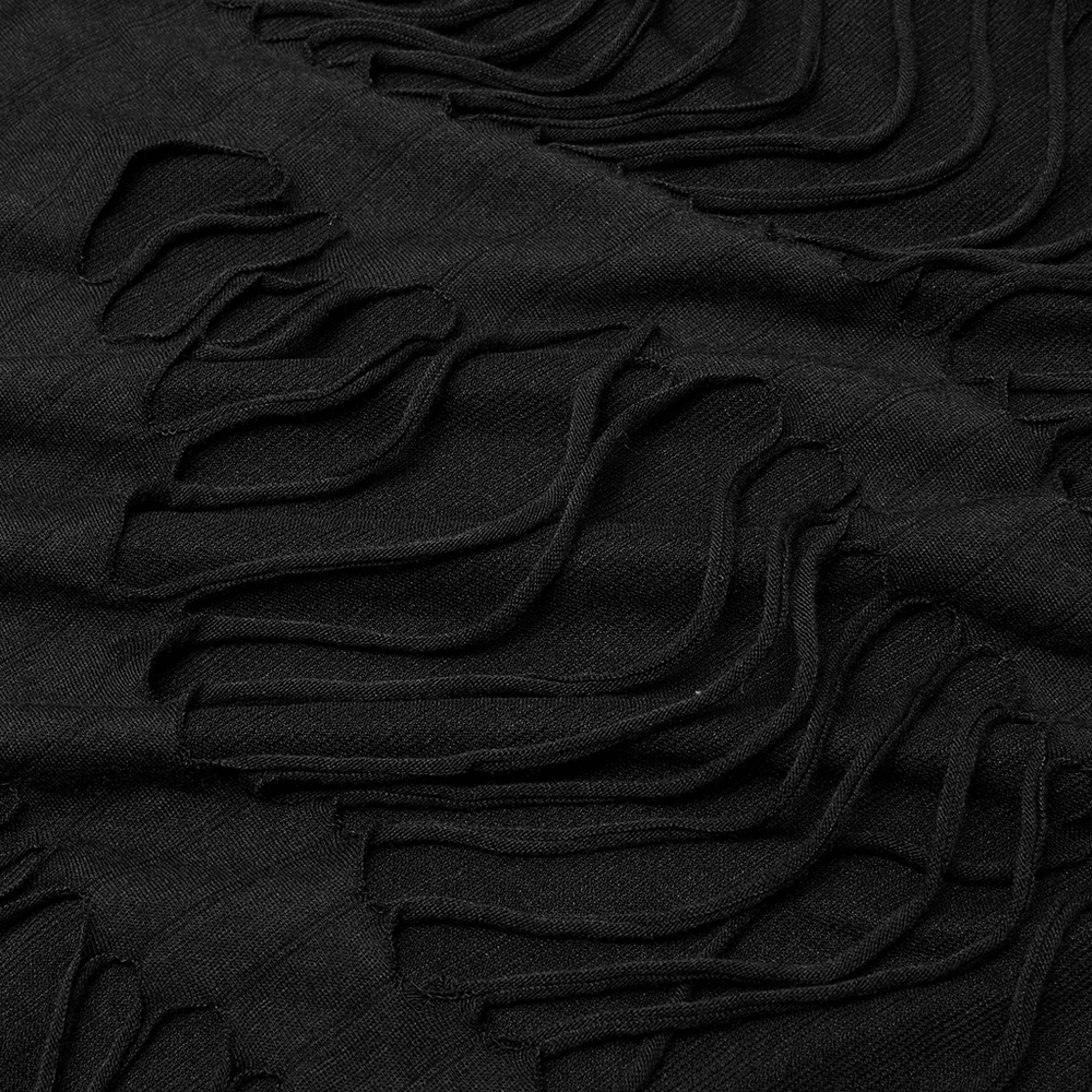 Close-up of distressed black fabric showcasing intricate ripped details for an urban gothic sweatshirt.