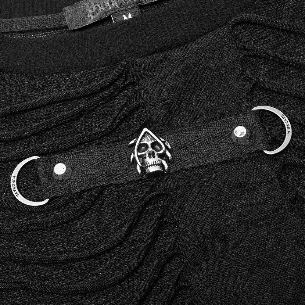 Close-up of a black gothic sweatshirt featuring skull and ring embellishments for a bold urban style.