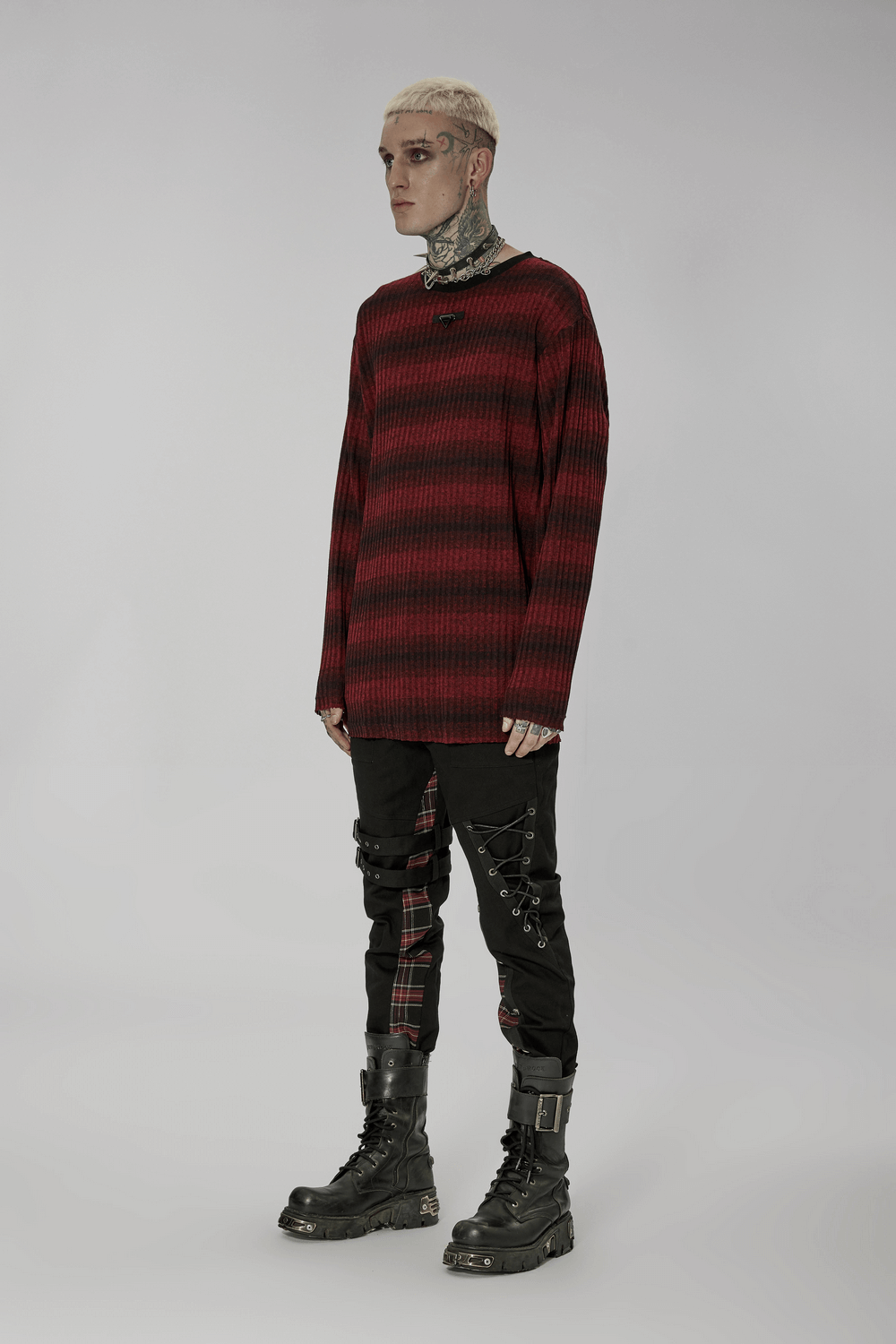 Men's edgy striped knit sweater in red and black, featuring metal detail and a relaxed fit, perfect for punk chic style.
