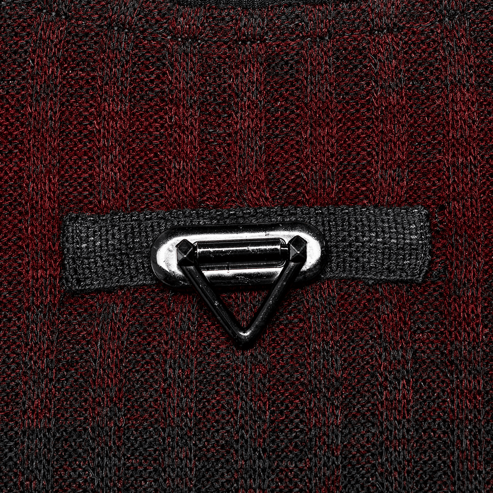 Close-up of metal buckle detail on men's striped knit sweater, showcasing edgy punk style and urban fashion.