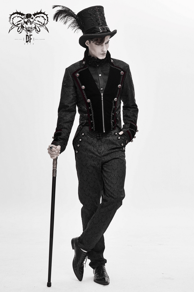 Stylish man in a gothic black jacket with brocade, top hat, and cane, showcasing elegant vintage fashion.