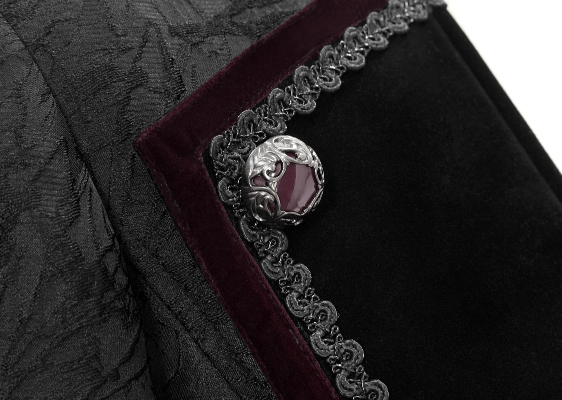 Close-up of a stylish black jacket's elegant embellishment and lacing detail, showcasing gothic vintage design.