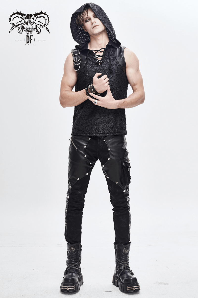 Men in punk style outfit featuring black faux leather zipper trousers and sleeveless hooded top.