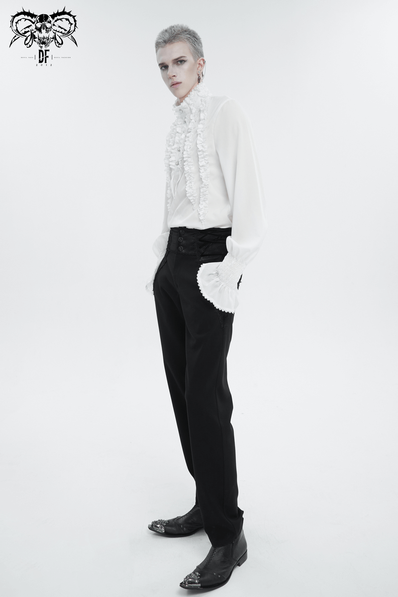 Men's frilly white shirt with ruffled cuffs and front buttons, paired with tailored black pants for a vintage style look.