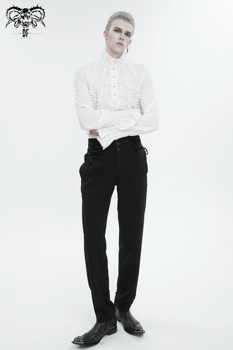 Men's vintage frilly white shirt with ruffled cuffs and buttons, paired with sleek black trousers and stylish shoes.