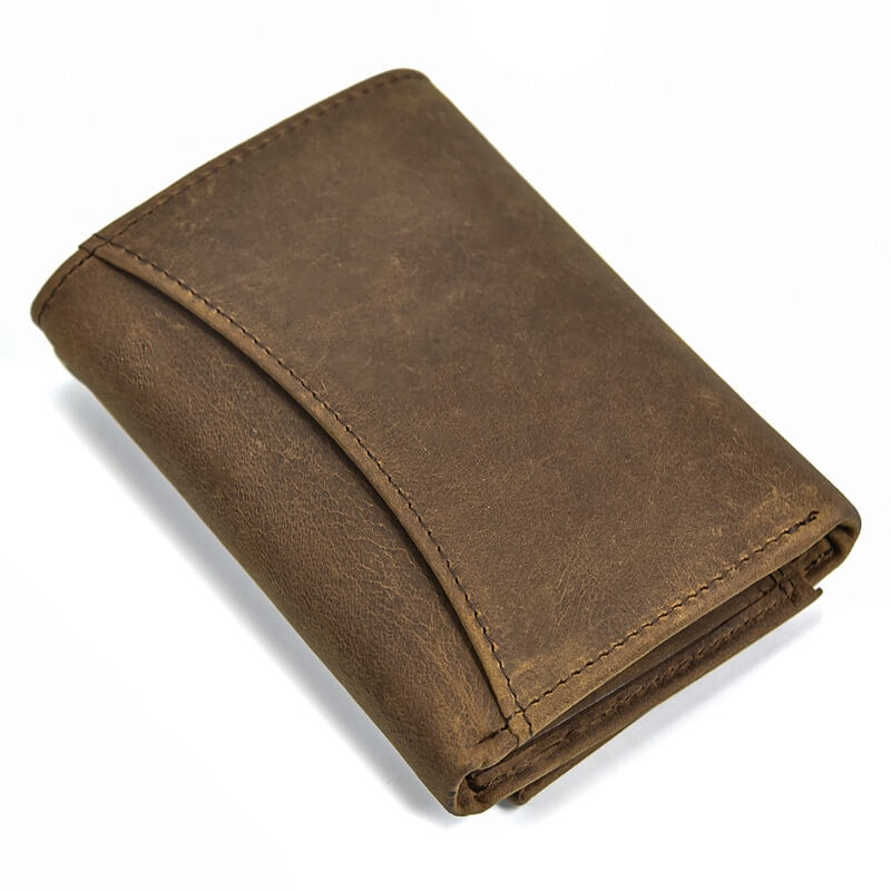 Men's genuine leather wallet in brown with stylish stitching, perfect for showcasing an edgy, alternative style.