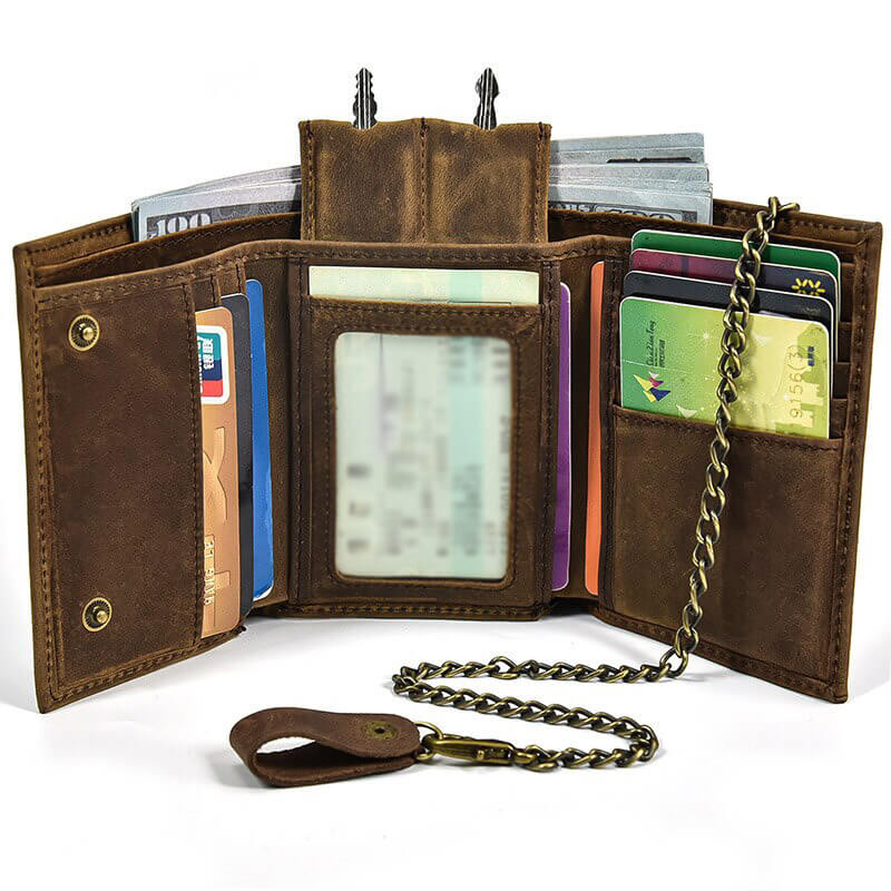 Men's gothic leather wallet opened with card slots and iron chain, featuring a rugged design and edginess.