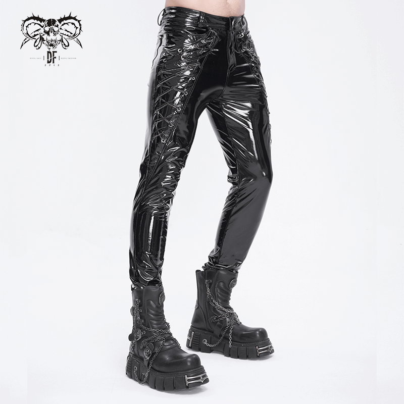 Men's glossy leather lace-up trousers with chains, showcasing a bold and edgy fashion style.