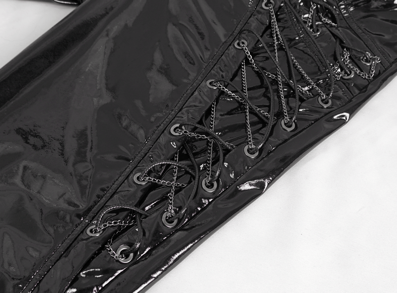 Close-up of glossy black leather trousers featuring bold lace-up details and metallic chains for an edgy look.