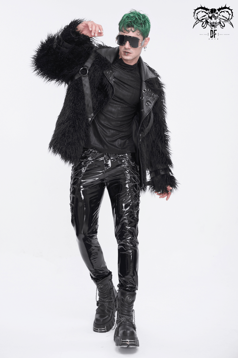 Stylish man in glossy leather trousers with chains, black fur coat, and sunglasses, embodying edgy fashion.