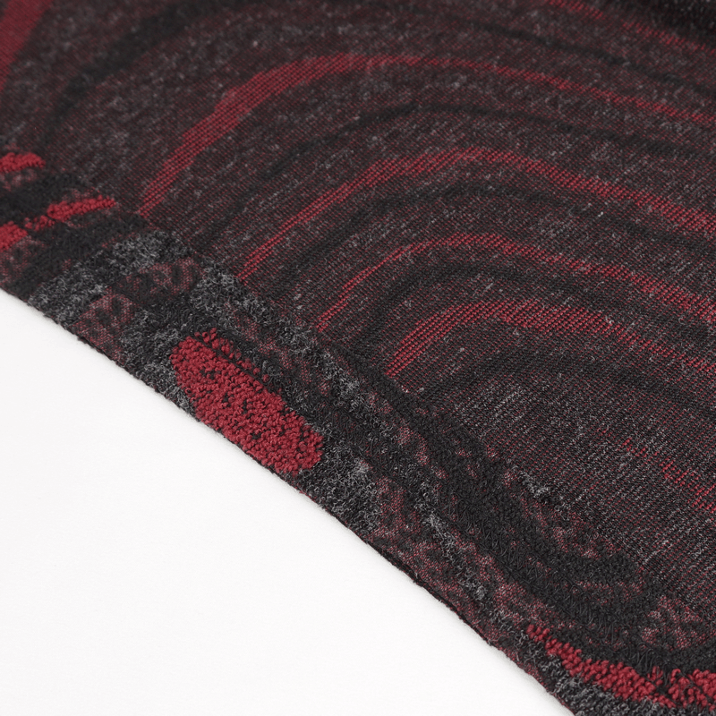Close-up of textured fabric in dark red and black, perfect for a gothic-style coat.