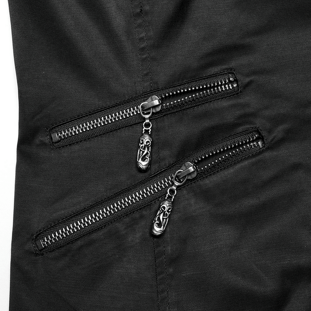 Close-up of metal zipper pockets on a men's gothic asymmetric waistcoat, showcasing intricate carvings and sleek design.