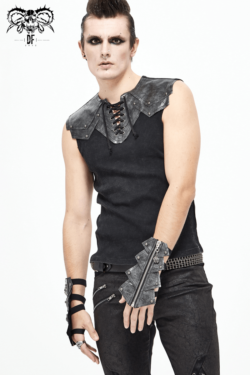 Men's gothic-style fashion featuring edgy open gloves, sleeveless top with lace-up detail, and dramatic makeup.