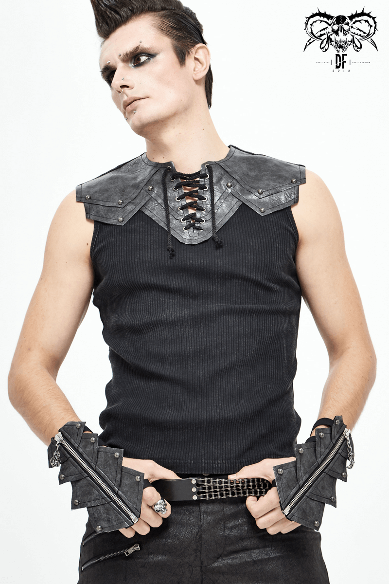 Stylish model wearing gothic black leather gloves and armor-style top, showcasing edgy fashion with spikes and laces.