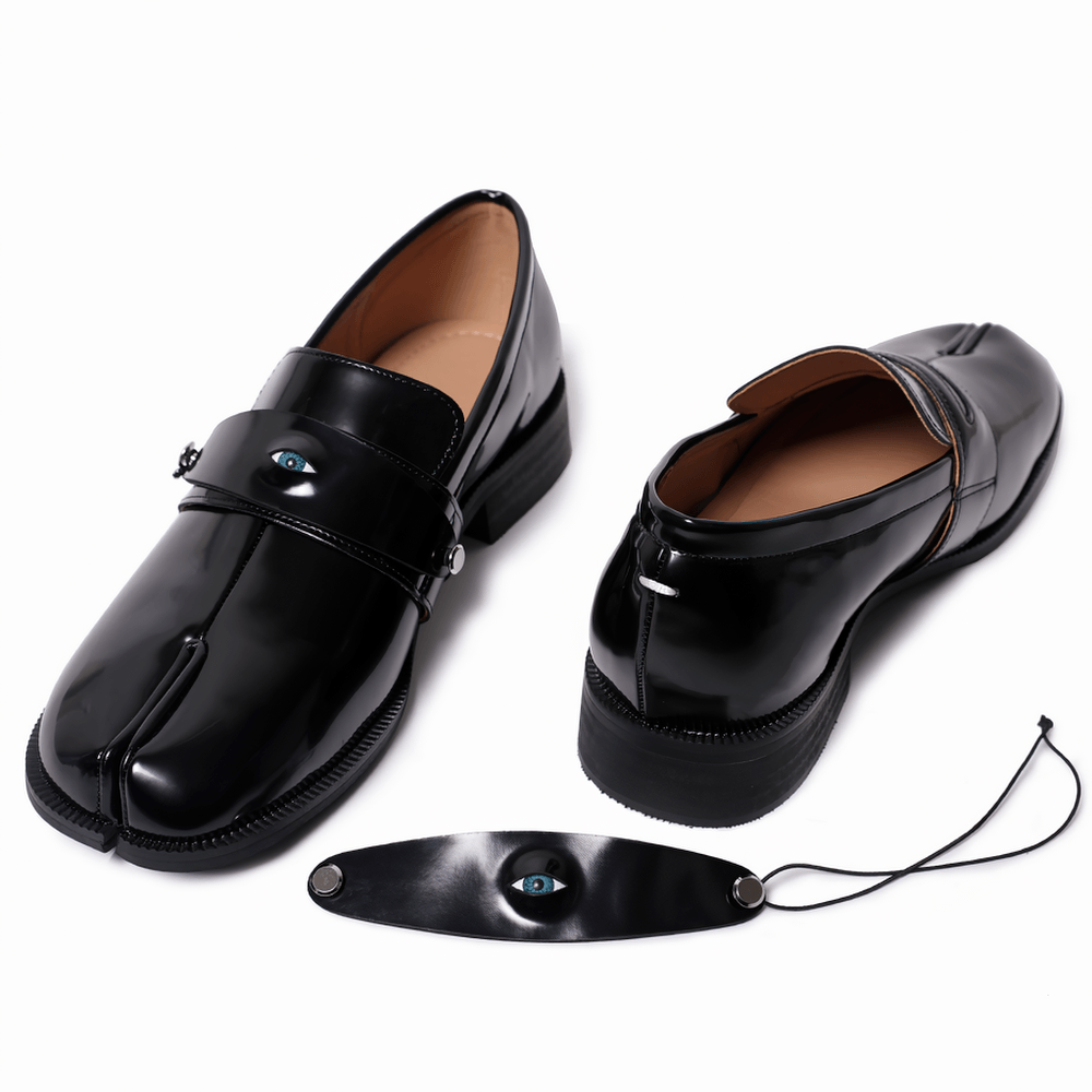 Mocassins gothiques noirs pour homme à bout fendu avec détail en forme d'œil