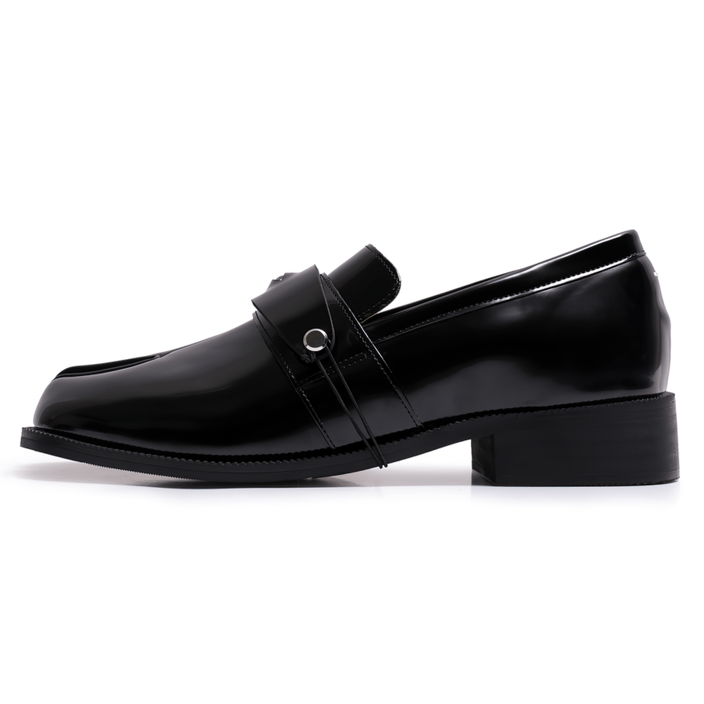 Mocassins gothiques noirs pour homme à bout fendu avec détail en forme d'œil