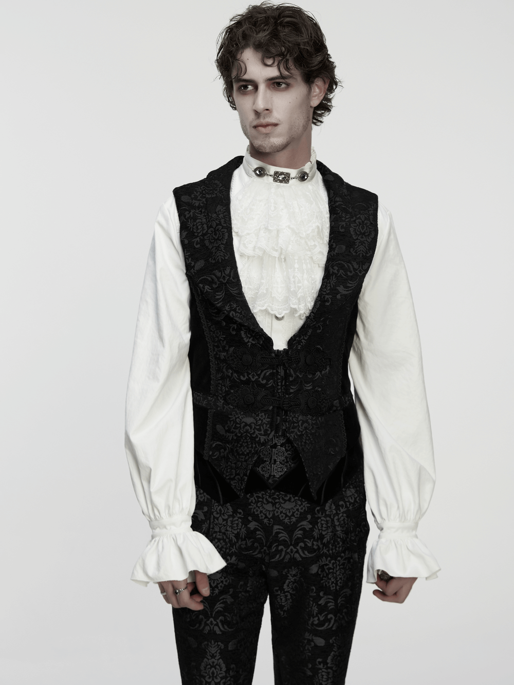 Men's Gothic Brocade Waistcoat with Vintage Buckle worn with a ruffled shirt and ornate collar.