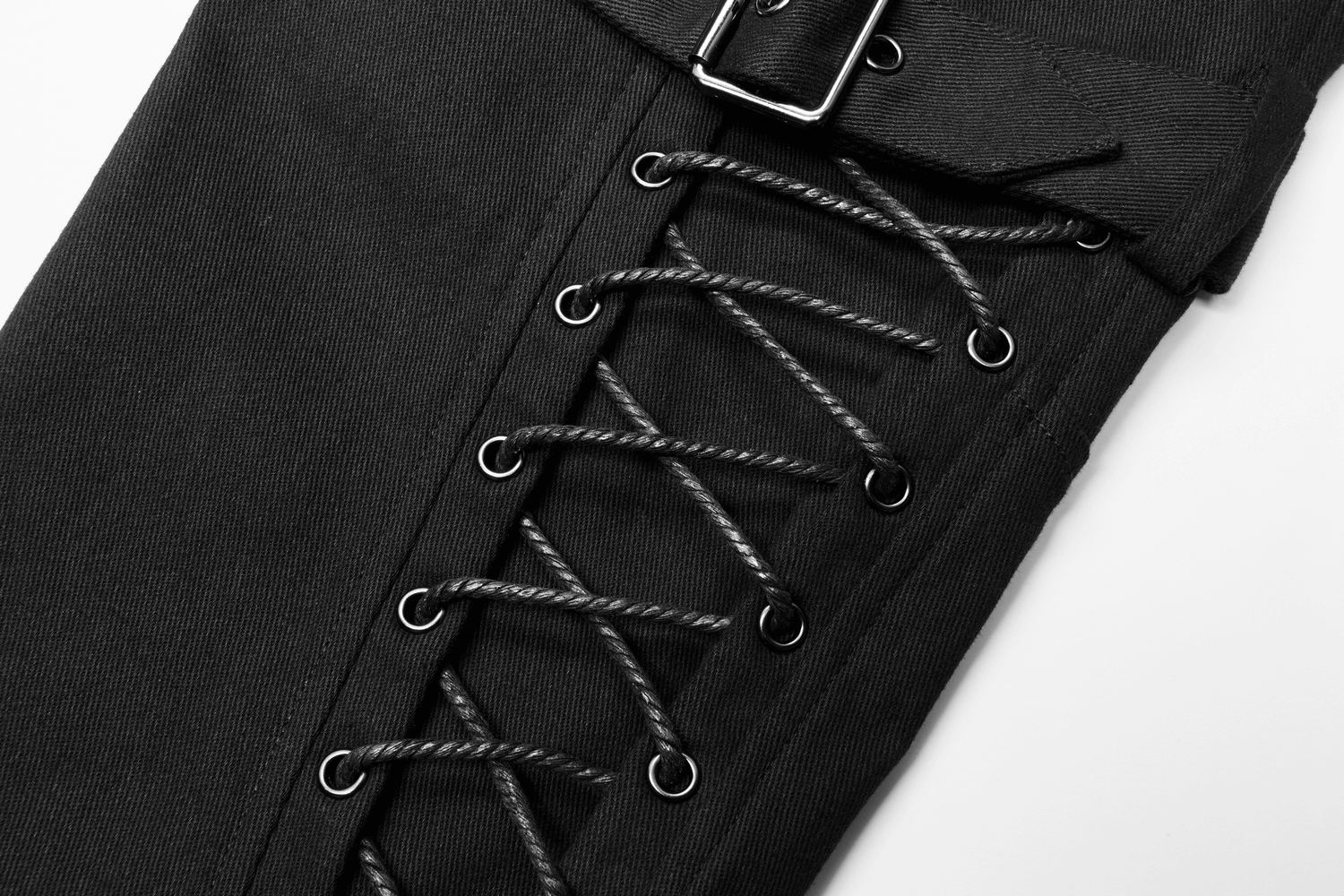Close-up of men's gothic cargo pants featuring lace-up detail and buckles for a punk-inspired look.