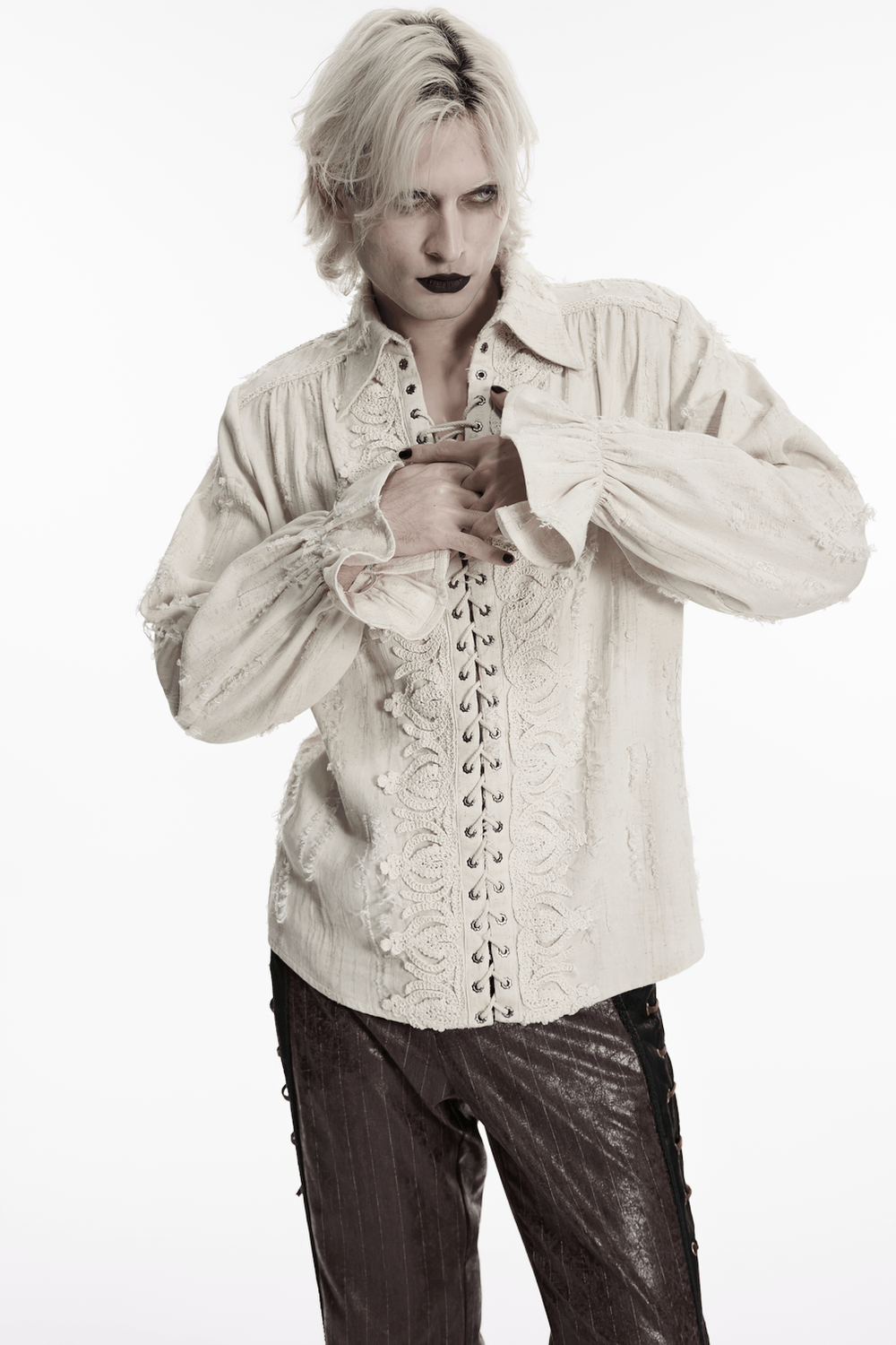 Men's Gothic Distressed Lace-Up Cotton Linen Shirt worn with dark style and flair, featuring lace details and flared sleeves.
