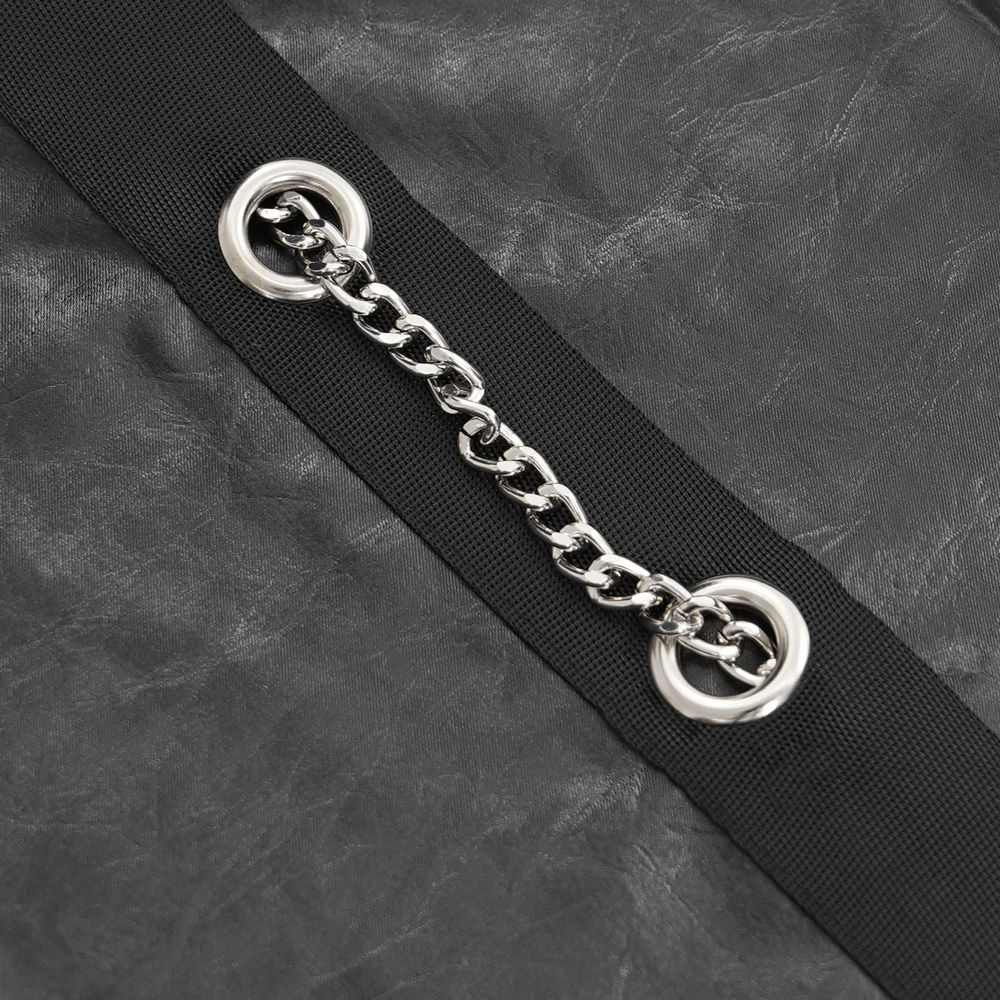 Close-up of chain detail on men's gothic faux leather shirt, showcasing edgy design and unique embellishments.