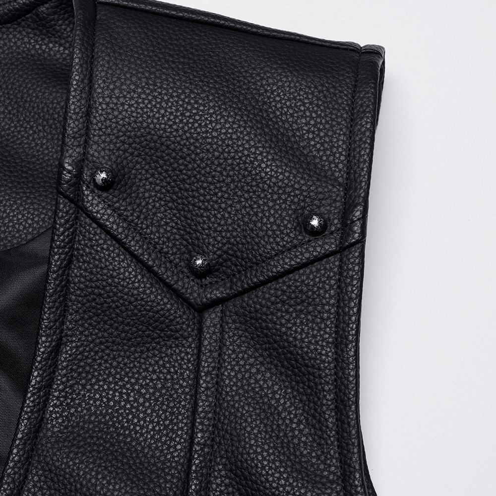 Close-up of men's Gothic faux leather vest detailing, featuring textured fabric and distinctive metal studs.