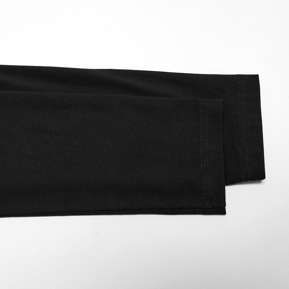 Close-up of black fabric showcasing neat stitching and clean edges for stylish, versatile clothing options.