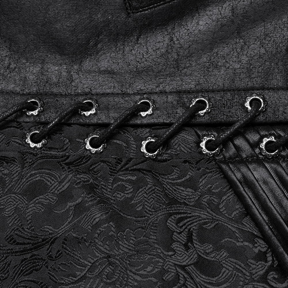 Close-up of men's gothic waistcoat featuring jacquard fabric and eyelet lacing detail for a stylish, tailored look.