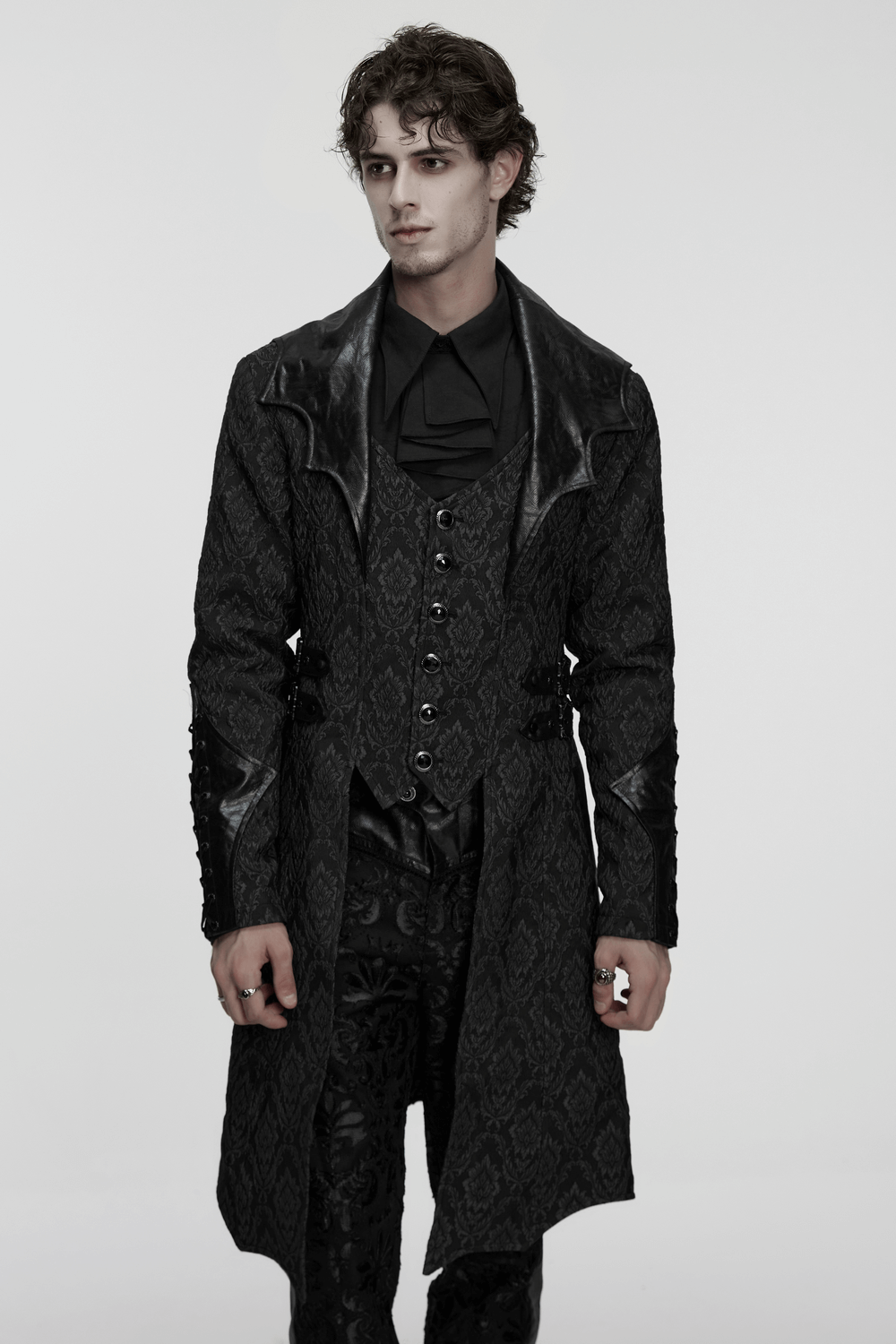 Men's Gothic Jacquard Coat with Bat Lapel and Details worn by model in striking gothic fashion.