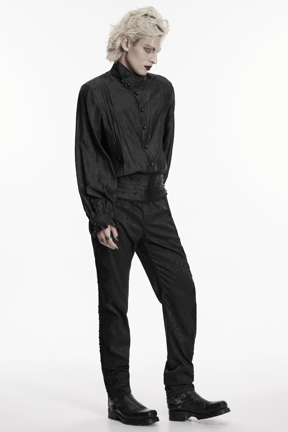 Men's Gothic Jacquard Pants with Baroque Pattern paired with a stylish black top and boots.