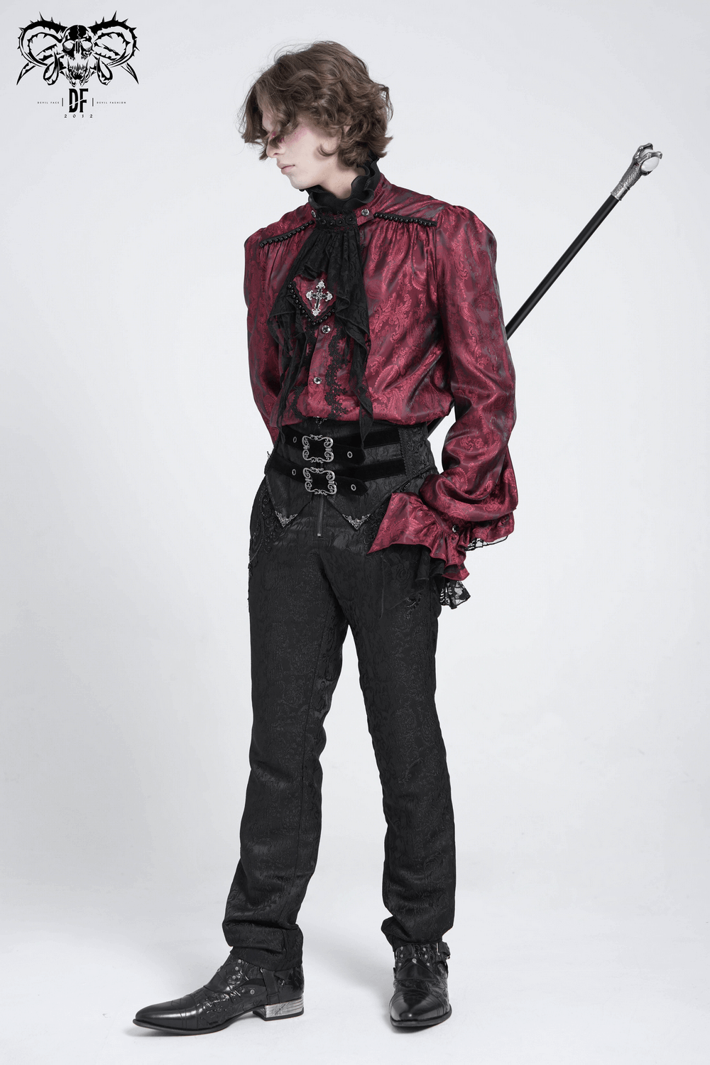 Men's gothic outfit featuring Victorian brocade pants, ornate jacket, and accessories, perfect for dark fashion lovers.