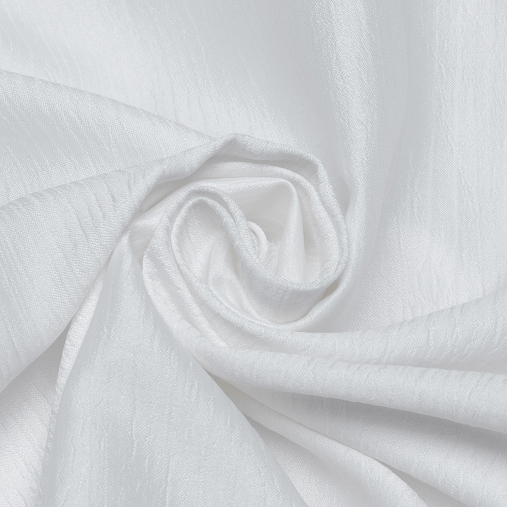 Soft, glossy white fabric in a swirling pattern, perfect for elegant gothic clothing and stylish design accents.