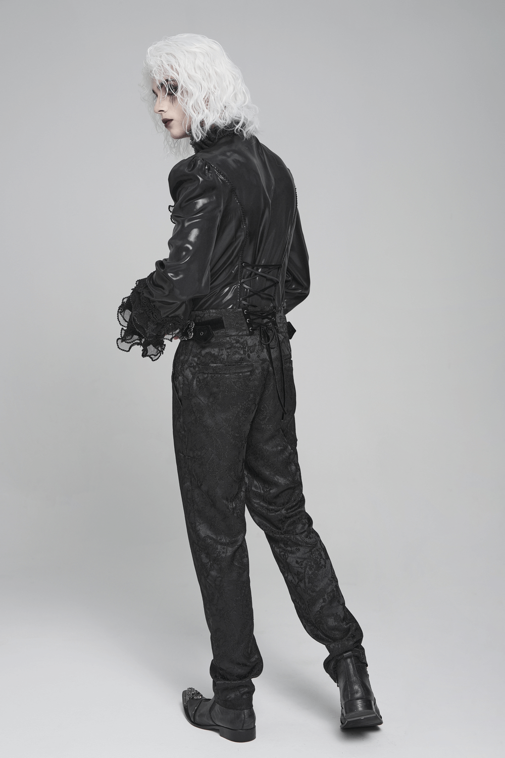 Men's Gothic Lace Ruffled Shirt with Lace-Up Back shown with stylish gothic pants and a sleek leather jacket.