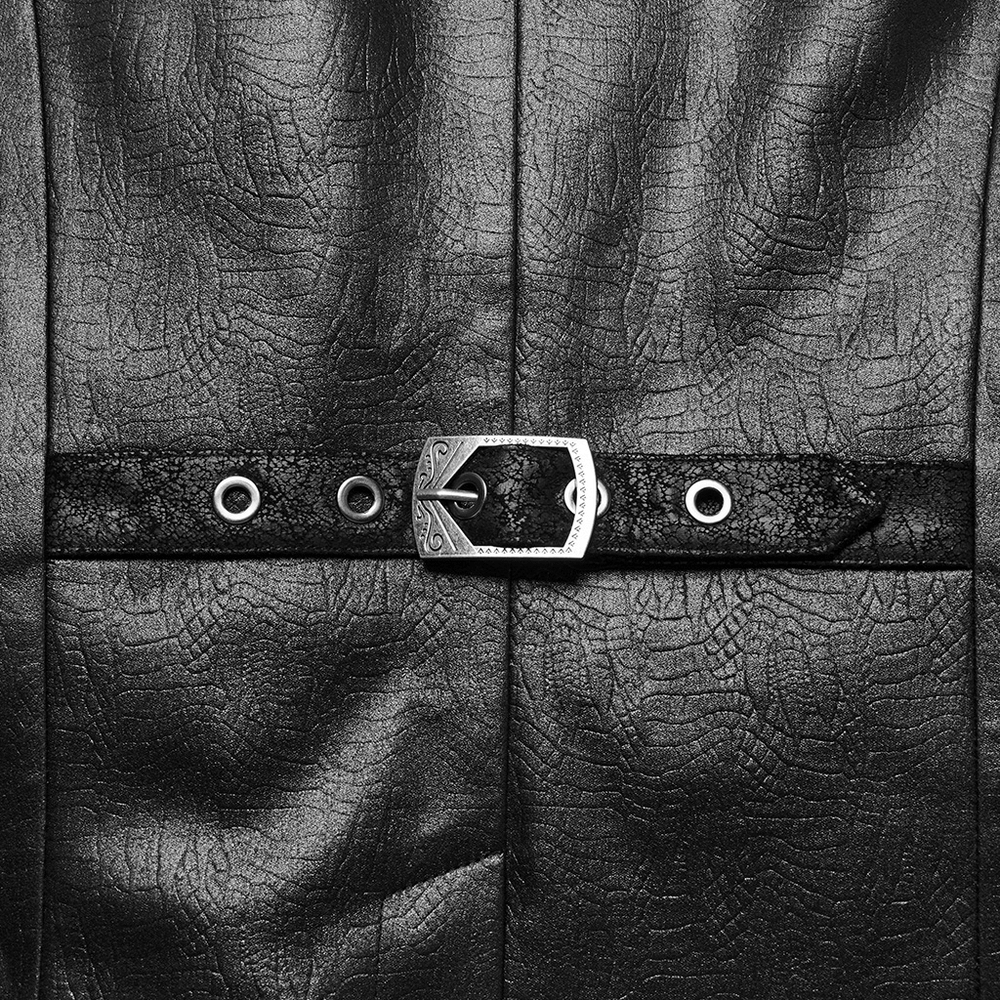 Close-up of a decorative buckle on a men's Gothic leather vest, showcasing intricate design and textured faux leather.
