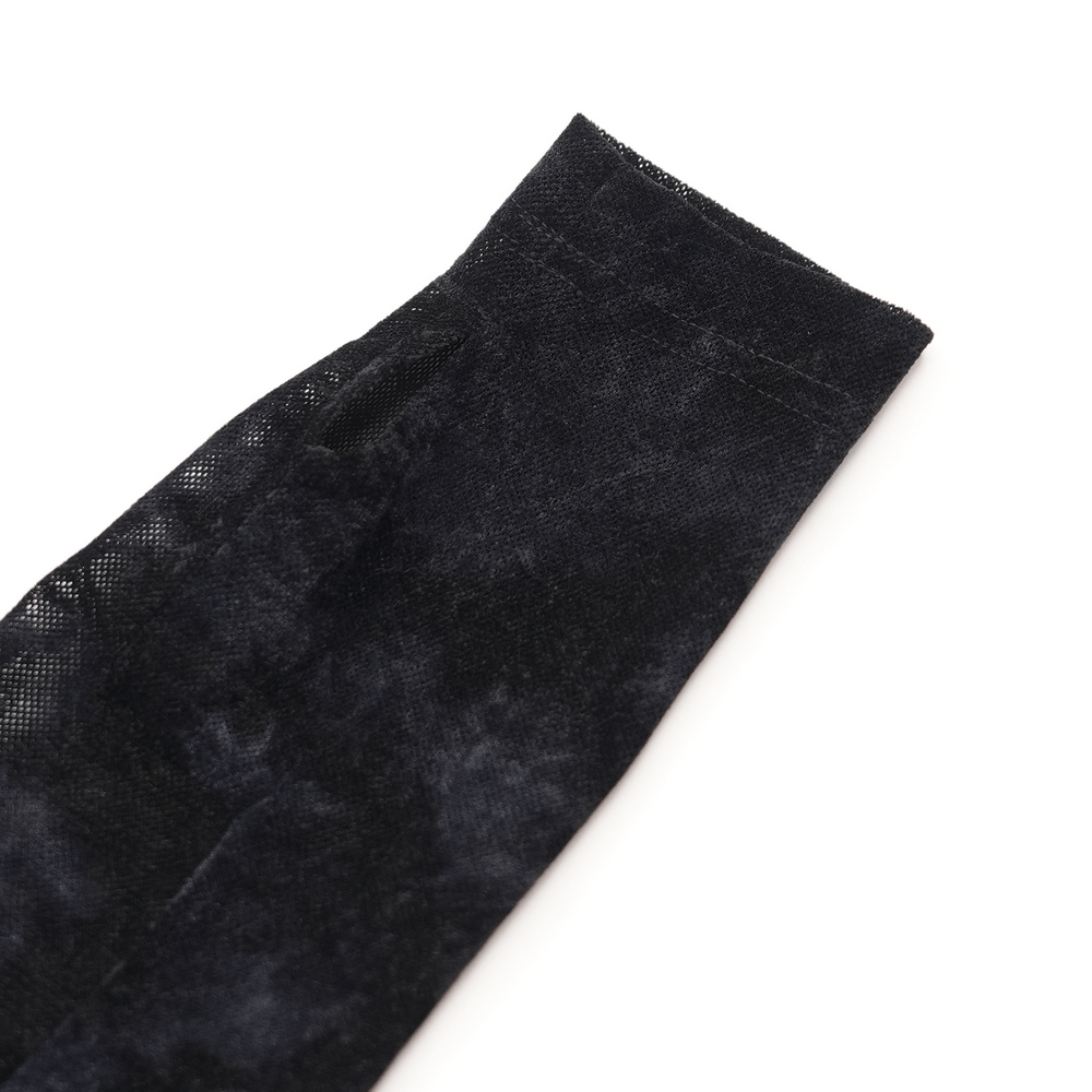 Close-up of the textured fabric of a men's gothic long-sleeved top showcasing intricate details and a dark color palette.