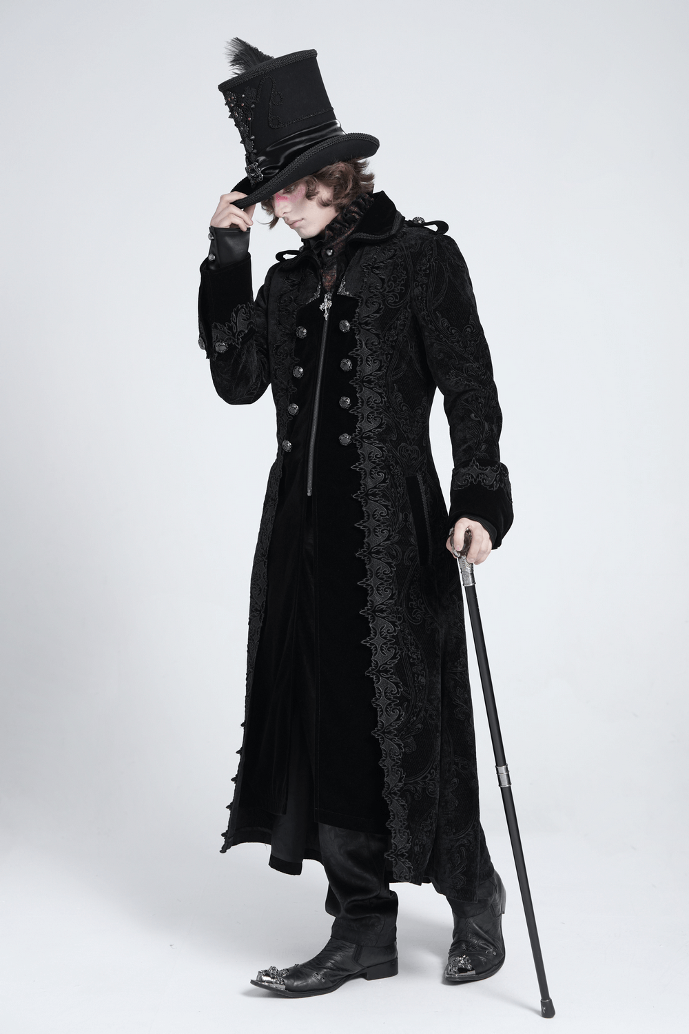 Men's Gothic long velvet coat with brocade trim, paired with a stylish top hat and cane, perfect for elegant occasions.