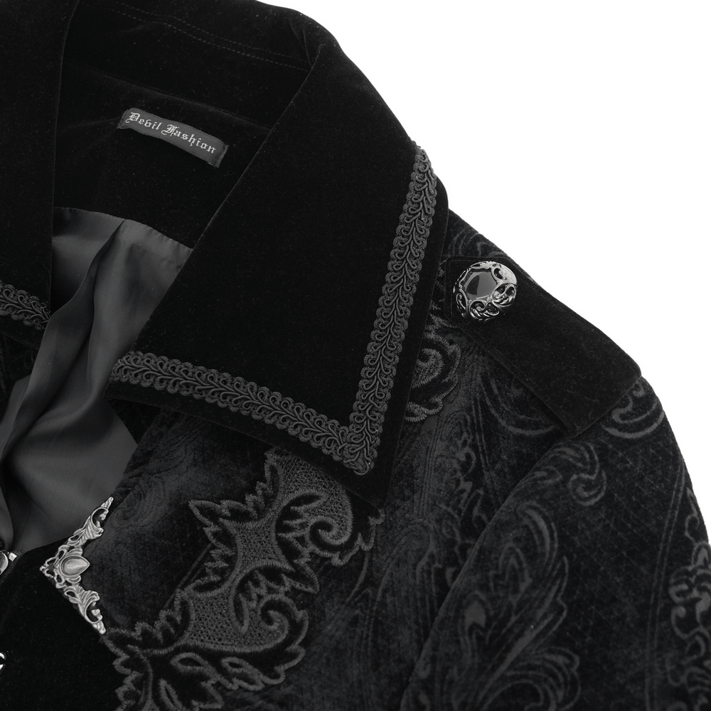 Elegant men's gothic long velvet coat with intricate brocade trim and stylish button details.