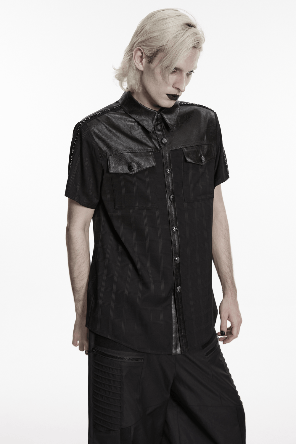 Men's Gothic Plaid Shirt with Leatherette Panels on model showcasing edgy fashion style.