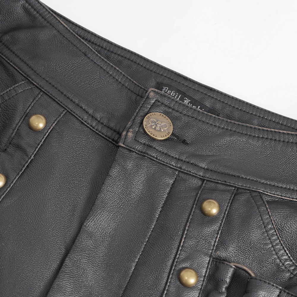 Men's black faux leather pants with gold studs and detailed stitching, perfect for a Gothic punk style.