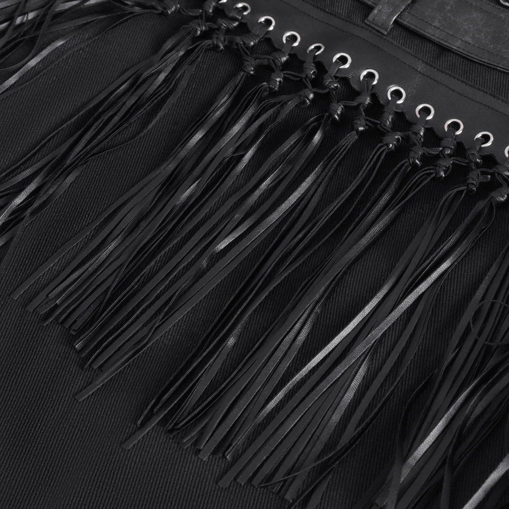 Close-up of black leather kilt tassels and eyelets, showcasing gothic punk style and edgy design.