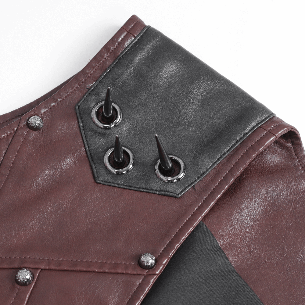 Close-up of men's Gothic punk studded synthetic leather vest with bold spikes and detailed stitching.