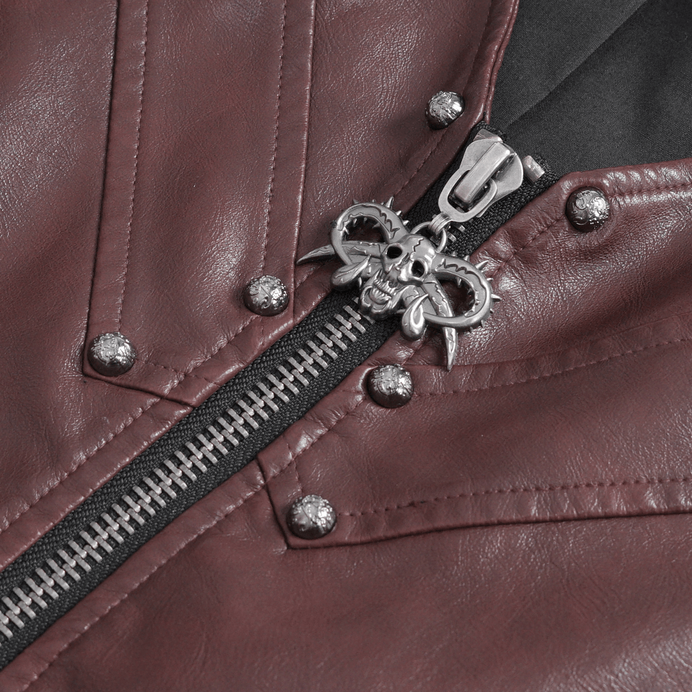 Close-up of men's gothic punk faux leather vest zipper with skull zipper pull and studded detailing.