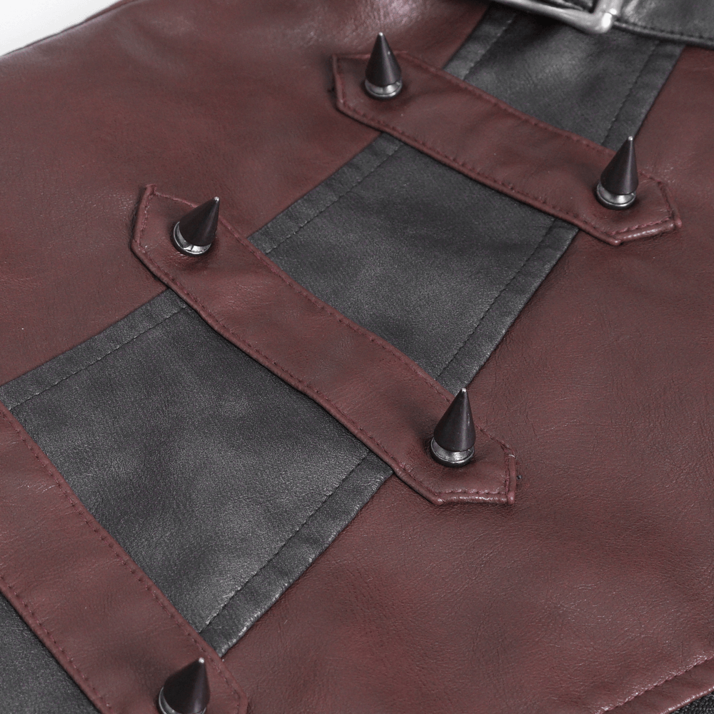 Close-up of gothic punk vest showing faux leather and studded design, perfect for edgy men's fashion.