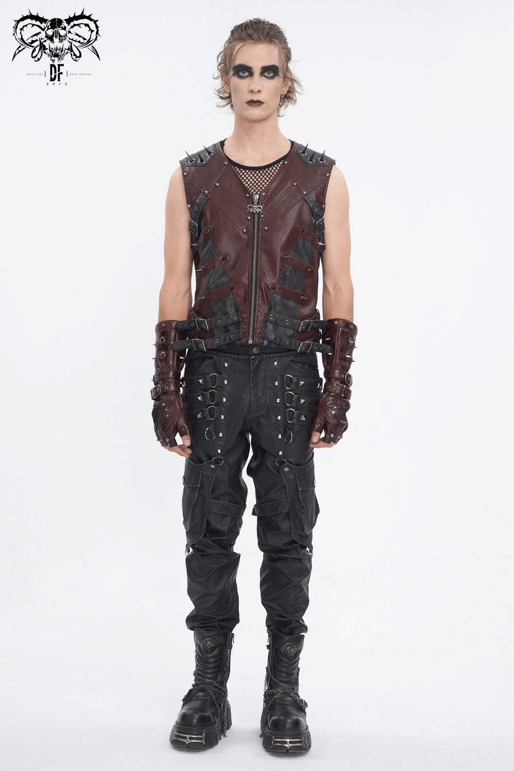 Men's gothic punk studded synthetic leather vest with zip front, paired with edgy black cargo pants and gloves.