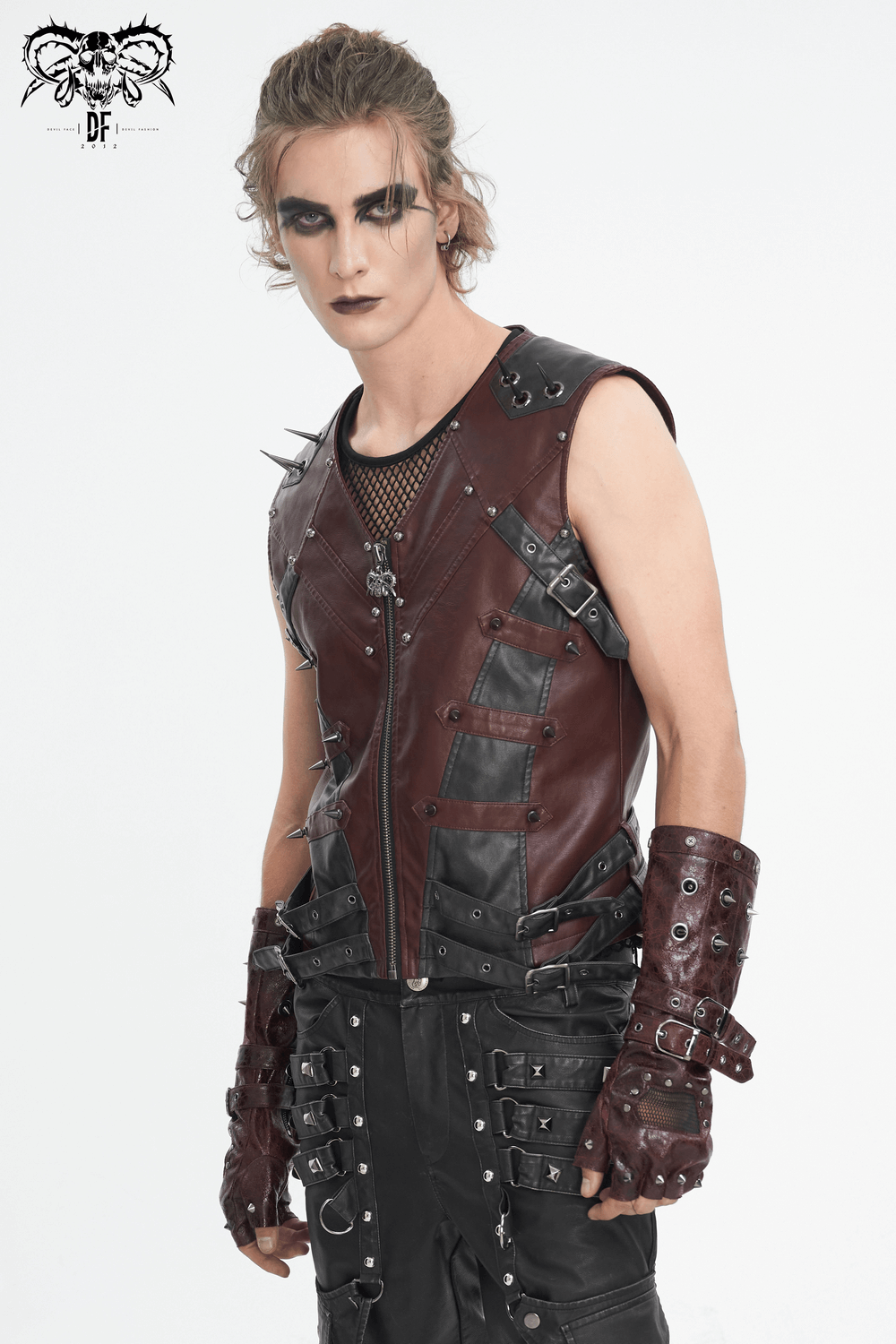 Men's gothic punk vest with studded design and edgy accessories, showcasing a bold rebel style.