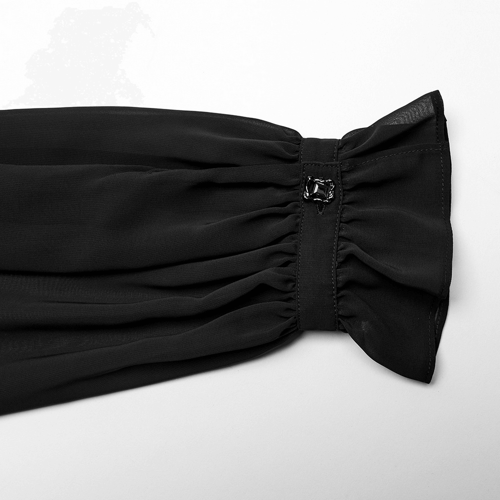 Close-up of the cuff detail on a men's gothic sheer chiffon shirt with elegant black fabric and lace-up accents.